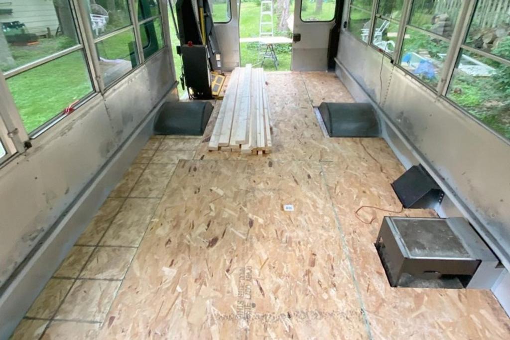 Cassie Furlong replaces the floor in her old school bus